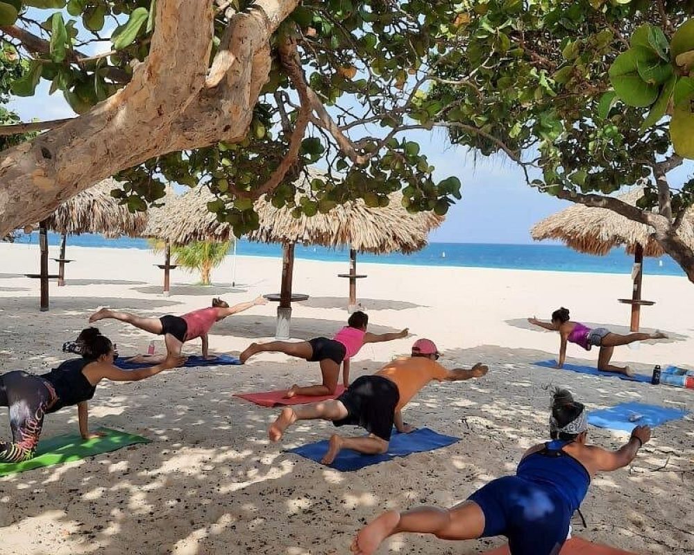 Group-Beach-Yoga-Balancing-Table-Pose.jpg