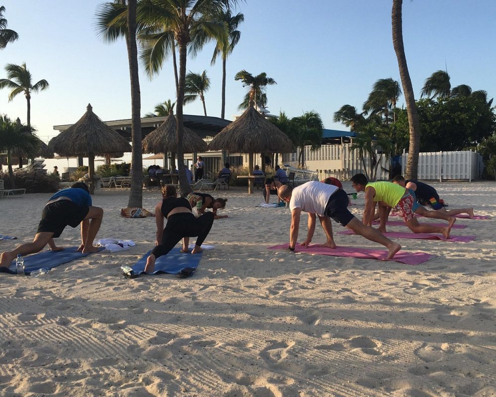 Group-Beach-Yoga-Low-Lunge-in-the-Early-Morning.jpg