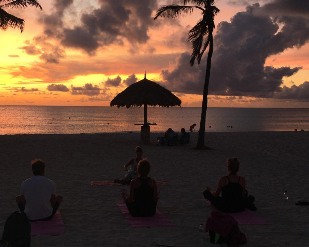 Group-Meditation-During-a-Dramatic-Sunset.jpg
