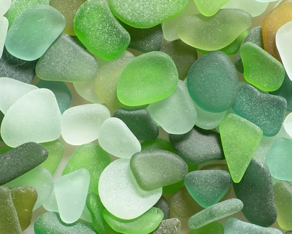 Sunset view over the Caribbean Sea with kayaks on the water in Aruba